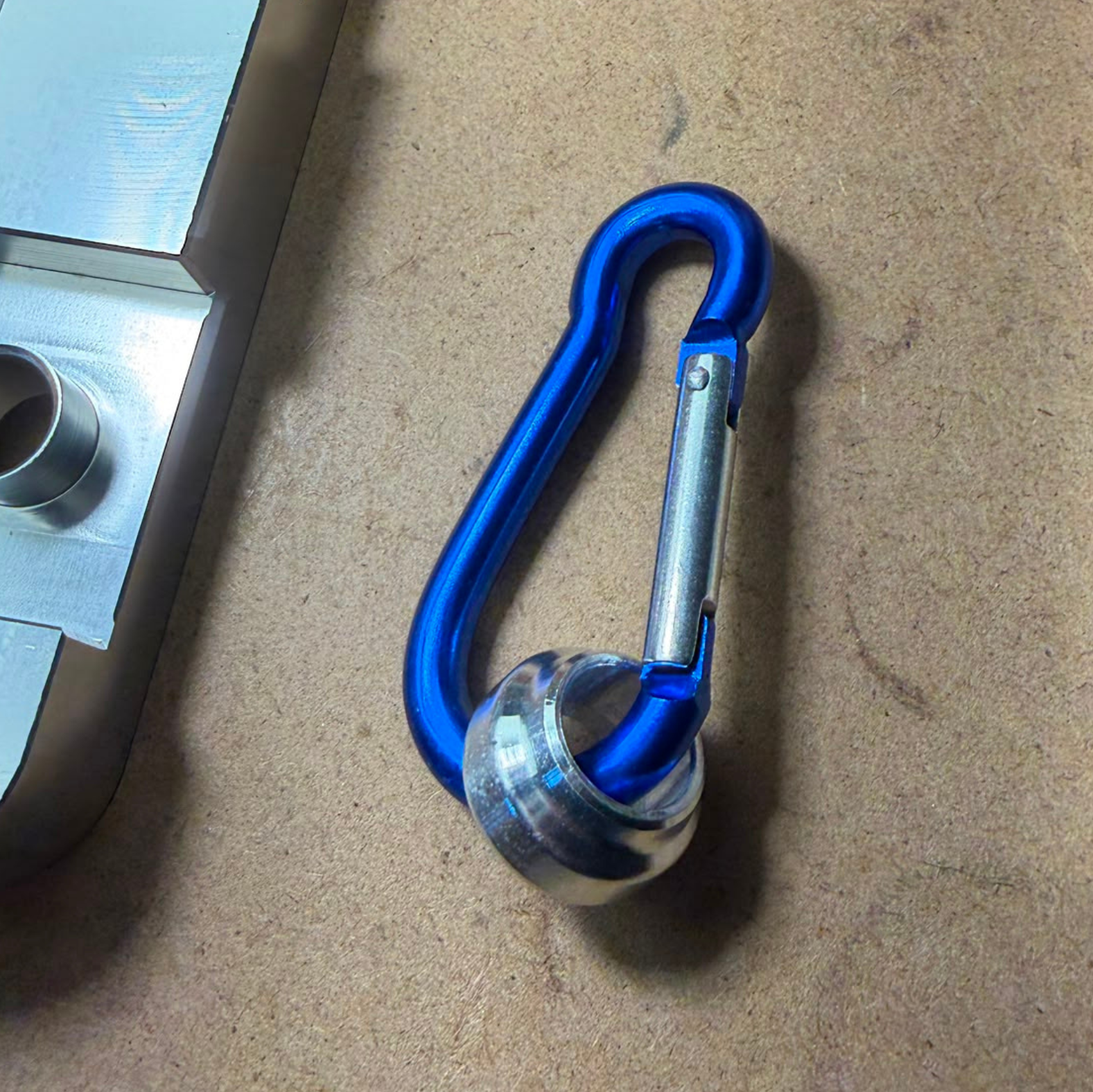 Looplox with blue carabiner accessory for organising and carrying bike security gear.