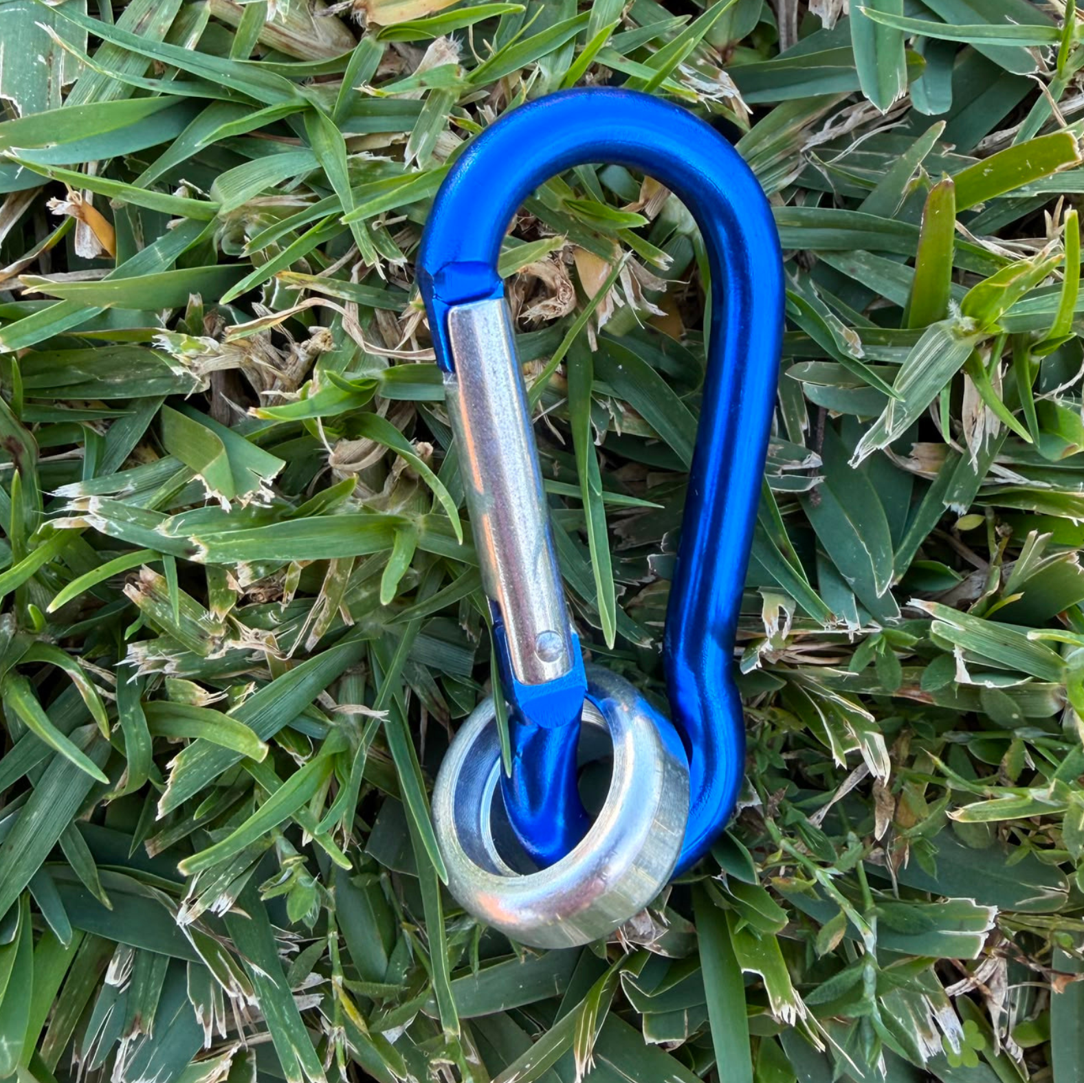 Looplox blue aluminium carabiner accessory with precision-machined metal component.