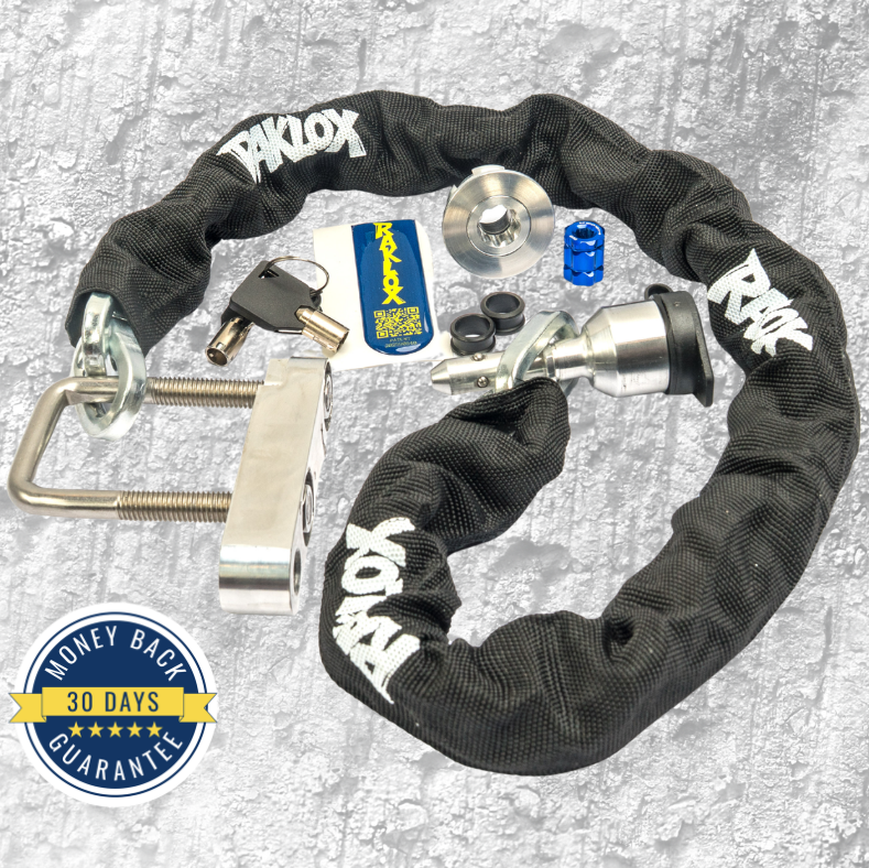 Black chain lock with keys and additional components on a textured surface, featuring RAKLOX branding.